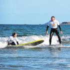 Hamish Brown stands tall as all ages get together off the land. Photo: Paul Richardson