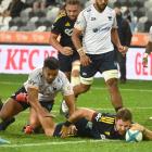 Highlanders reserve hooker Rhys Marshall dives over to score during his team’s Super Rugby...