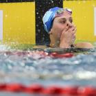 Otago swimmer Caitlin Deans reacts to her performance at the New Zealand championships in...