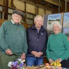 Texel breed committee chairman Paul Gardner (centre) made a presentation to retiring Texel...