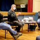 Fire and Emergency staff (from left) Jason Sarich, Graeme Still and James Knapp discuss fire...