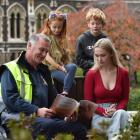 Steve Crosland, of Dunedin, reads one of his three children’s books, Grandad’s Nose Hair, to his...