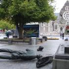 A statue of Christchurch founder John Robert Godley, smashed from its pedestal by the force of...