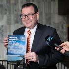 Finance Minister Grant Robertson with the Wellbeing Budget 2022 Photo: RNZ