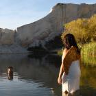 Christopher Ulutupu takes a swim at St Bathans, watched by his sister Fame Ulutupu in her angel...