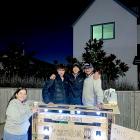 Resident Cinta Terry stops by for a chat with the Sydenham Street Wavers. Photo: Supplied