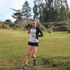 Becky De La Harpe runs the second 2km leg for the Caversham women’s team during the Leith cross...