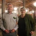 Derek Beveridge, and his wife, Jenifer, at the Loan and Merc celebrating his 35 years’ service to...