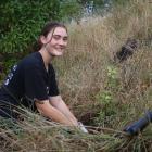 Student Volunteer Army member Francesca Holdcroft, of Canterbury, helps Forest and Bird with...
