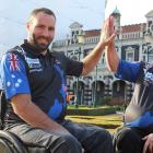 Rob Gillan (left) and Patrick Morrison high-five before their trip to Belgium. PHOTO: SIMON...