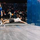 New Zealand’s world No1, Paul Coll, dives to retrieve the ball during his world championship...