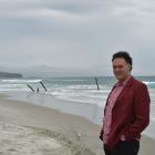 Jules Radich at St Clair Beach in December last year. Just one of the poles that formed part of...
