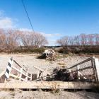 The Scott Lane bridge over the Kyeburn River has sat broken since a portion of it was swept away...