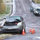 A crashed car in icy conditions at the intersection of Orbell and Fea St, in Dunedin, yesterday...