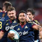 Folau Fakatava of the Highlanders celebrates scoring a try during the round 12 Super Rugby...