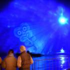People watch a preview of the Matariki immersive show on Otago Harbour. Over three nights, water...