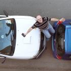 Dunedin man Warren Gray was frustrated to find his ute trapped in place in Cumberland St...