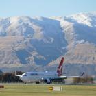The first Qantas flight in 330 days touches down at Queenstown Airport last month. PHOTO: TRACEY...