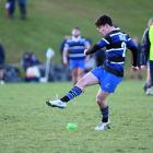 Nic Profitt kicks for goal during Kaikorai’s 19-0 win over Green Island at Bishopscourt last...