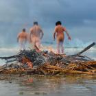 Hardy souls shed their winter woollies for a dip in the ocean at Warrington Beach for a Southern...