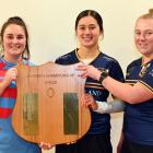 Big River Country captain Tegan Hollows and Dunedin co-captains Maia Joseph and Gemma Millar...
