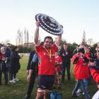 Kurow players and coaches celebrate winning consecutive Citizens Shield finals in Oamaru on...