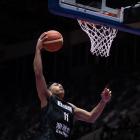 Flynn Cameron dunks during the FIBA Asia Cup quarter-final between South Korea and New Zealand at...