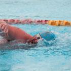 Doug Robinson competes in the 1000m swim during session four of the inaugural New Zealand...