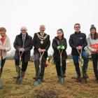 Mayor of Solihull Ken Meeson, Severn Trent staff and others plant some of the first Games forest...