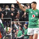 Irish captain Johnny Sexton raises his arm in jubilation as his team extends its lead over the...