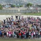 Anticipating an extension to their school grounds are St Clair School pupils and staff at former...
