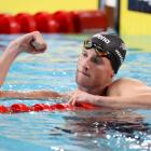 Andrew Jeffcoat celebrates his win in the 50m backstroke final. Photo: Reuters 