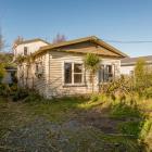 A two-bedroom bungalow on Sinclair St in New Brighton, Christchurch, was sold “as is, where is”....