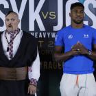 Oleksandr Usyk (left) and Anthony Joshua face the media at their Rage on the Red Sea press...