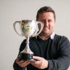Alexandra Rugby Club member Peter Breen with the Bob Scott Cup. Last contested in 1999, the cup...