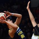 The Otago Nuggets’ Nikau McCullough shoots while defended by the Franklin Bulls’ Isaac Davidson...