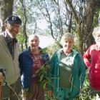 Members of the Papatowai Forest Heritage Trust, led by (from left) Fergus and Mary Sutherland,...