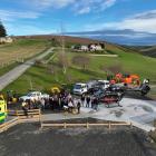 Project leaders and emergency service personnel welcome the Otago Regional Rescue Helicopter to...