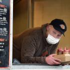 Joel Kenton is making the most of his last days in his beloved food truck. PHOTO: PETER MCINTOSH