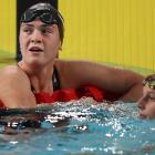 Erika Fairweather congratulates silver-medal winning Canadian Summer McIntosh. Photo: Getty Images