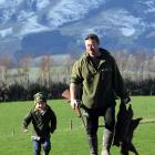 Kelso pest destruction worker Jason Rogers and his son Dwayne (4). Photos: Stephen Jaquiery