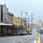 Container-handling cranes are visible from the main street of Port Chalmers, George St. PHOTO:...