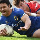 Raymond Nu’u scores a try for Otago as Tasman winger Macca Springer is left in his wake at...
