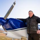 Michael Evans, of Arrowtown, pictured with his home-made Vans Aircraft RV-6 which took almost 30...