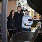Strictly Coffee Company owners Malina and Dan Daulton (centre) and head roaster Jarred Baigent...