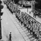 Troops march up the main street of British-controlled Pera, part of the the European quarter of...