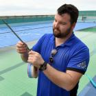 Dunedin City Council community pools supervisor Ben Harrison checks the temperature of the St...