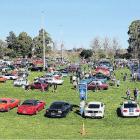 Some of the hundreds of custom, classic and hot rods on display at the Rock ’n’ Wheels show and...