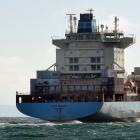 The Port Otago pilot launch Aramoana follows container ship Oluf Maersk to retrieve the pilot off...
