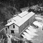 Water gushes from the tail races of Waipori Falls power station. — Otago Witness, 10.10.1922